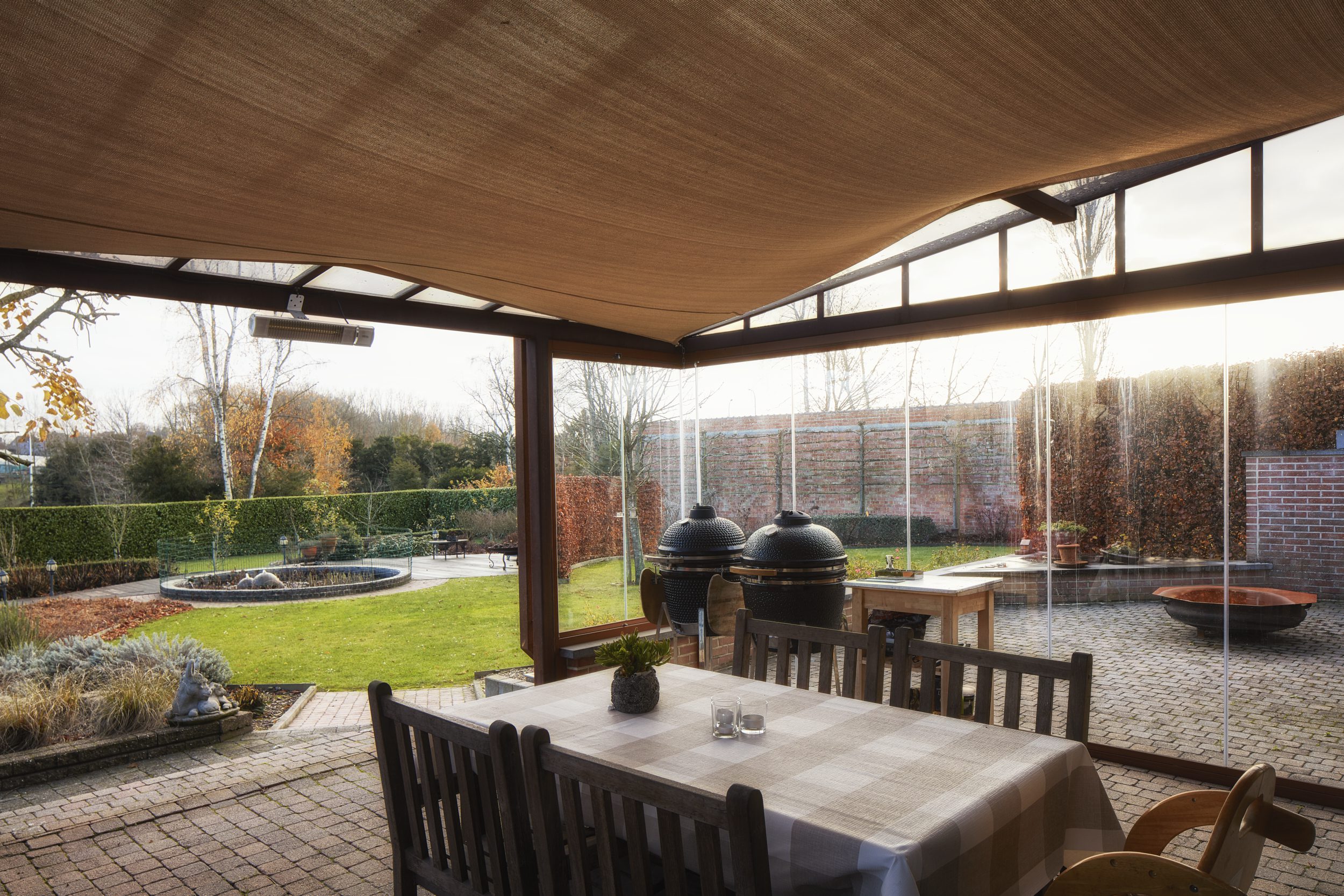 Terrasoverkapping met Sliding Glass ONE en vrij zicht op de tuin
